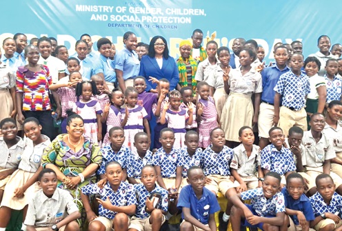 Dr Agnes Naa Momo Lartey (arrowed), Minister for Gender, Children and Social Protection, with some of the schools that participated in the World Children's Day celebration which also convened the Seventh Sitting of the National Children's Parliament