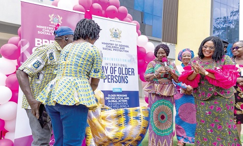 Vice-President Prof. Naana Jane Opoku-Agyemang (2nd from right) and Dr Agnes Naa Momo Lartey (right), Minister of MoGSCP, commemoratesing the International Day of Older Persons
