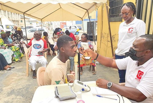 A nurse checking the vital statistics of a participant