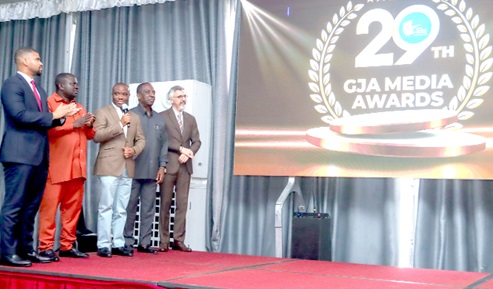 Felix Kwakye Ofosu (middle), Minister of Government Communications, launching the 29th GJA Awards. With him are Albert Kwabena Dwumfour (2nd from left), President, GJA; Oheneba Kwaku Duah (left), Managing Director, Ashanti Green Initiative, and some dignitaries. Picture: ELVIS NII NOI DOWUONA 