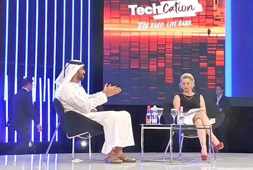 Abdulla Bin Touq Al Marri (left), Minister of Economy and Tourism for the UAE, speaking at the opening of GITEX GLOBAL 2025 in Dubai, United Arab Emirates