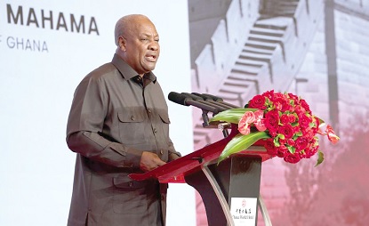 President John Mahama (inset) speaking at the Investment Forum in Beijing, China