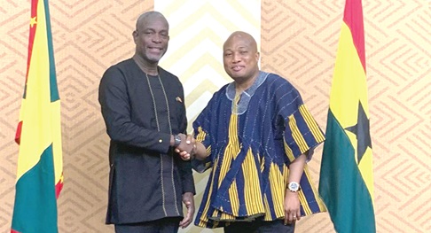 Samuel Okudzeto Ablakwa (right), Minister of Foreign Affairs, in a handshake with Joseph Andall, the Grenada Minister of Foreign Affairs, Trade and Export Development, at the Political-Consultation meeting