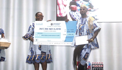 Baba Hamidu (right), the winner of the Wear UG Day Fashion show receiving his prize from Prof. Nana Aba Appiah-Amfo (left), the Vice Chancellor of the University of Ghana. 
