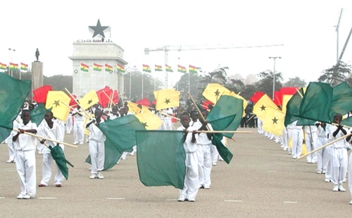 Ghanaian youth demonstrating the spirit of patriotism with the national flag