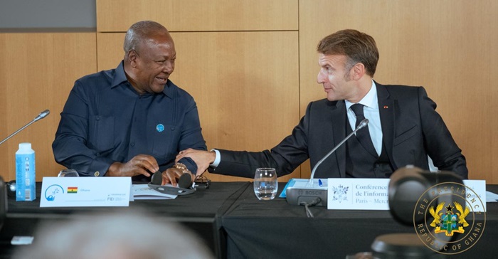 President John Dramani Mahama interacting with French President Emmanuel Macron at the 2025 Paris Peace Forum.