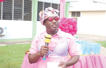 Dr Foster Amponsah-Manu (inset), Clinical Director of the Eastern Regional Hospital, addressing breast cancer survivors in Koforidua 