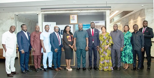 John Jinapor (middle), Minister of Energy; Afetsi Awoonor (2nd from left), MD, BOST, and management members of BOST after the event
