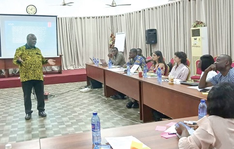 Wilberforce Laate (standing), Deputy Executive Director, CIKOD, leading a discussion with the participants