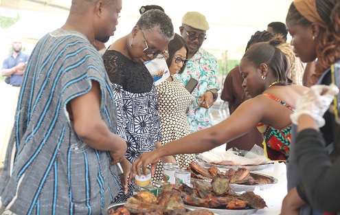 Emelia Arthur, Minister of Fisheries and Aquaculture, interacting with exhibitors during her inspection