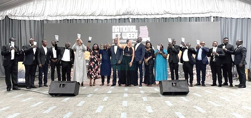 Some of the award winners showcasing their award shields during the National ICT Week 2025 Awards Night celebration