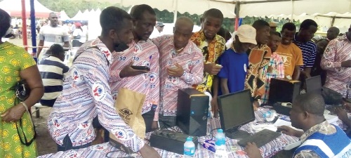 Some of the members going through the voting process at the AGM