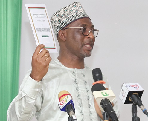 Muntaka Mohammed-Mubarak, Minister for the Interior, launching the document to guide religious tolerance in government-assisted and private mission schools in Accra