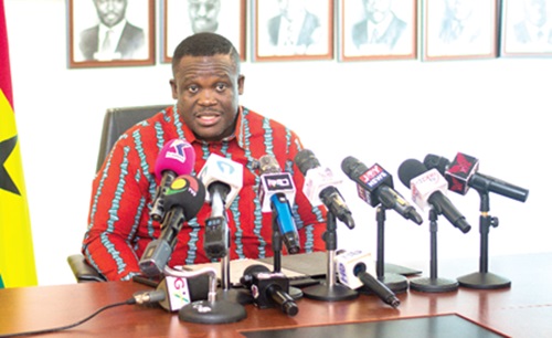 Samuel Nartey George, Minister of Communication, Digital Technology and Innovations, addressing the press conference in Accra