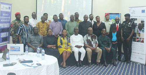 Theodora Williams Anti (seated 3rd from left), Executive Director, Foundation for Security Development in Africa, with Prof. Kwame Gyan (seated 3rd from right), Senior Lecturer, UG School of Law; Dr Ndubuisi Christuan Ani (seated right), Project Coordinator, ISS ENACT Project, some security officials and other participants. Picture: ERNEST KODZI 