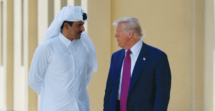 US PRESIDENT Donald Trump talks with Qatari Emir Tamim bin Hamad Al Thani in Doha in May. (photo credit: BRIAN SNYDER/REUTERS)