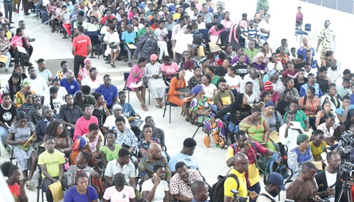 Some of the students and their parents with placement challenges at GNAT Hall in Accra. Picture: SAMUEL TEI ADANO
