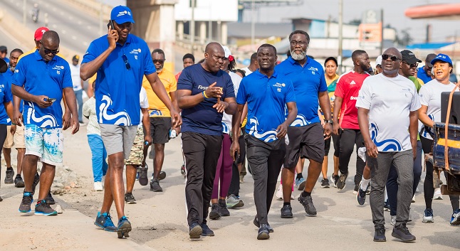 A cross section of Rotarians walking to raise funds for their projects