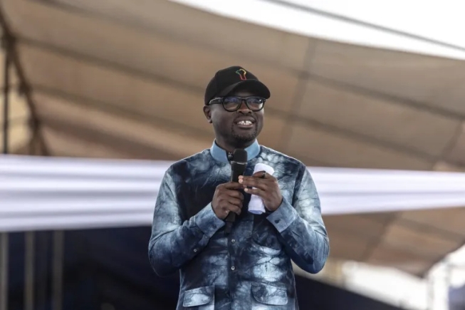 Presidential candidate Romuald Wadagni gives a speech during a campaign rally in Cotonou on April 10, 2026, before Benin's presidential election on April 12, 2026 [Olympia De Maismont/AFP)]