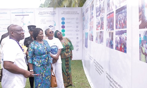 Prof. Naana Jane Opoku-Ageymang (2nd from left), Vice-President, and Emelia Arthur (2nd from right), Minister of Fisheries and Aquaculture, and other dignitaries inspecting an exhibition of the activities and processes leading to the establishment of the MPA Prof. Naana Jane Opoku-Ageymang (2nd from left), Vice-President, and Emelia Arthur (2nd from right), Minister of Fisheries and Aquaculture, and other dignitaries inspecting an exhibition of the activities and processes leading to the establishment of the MPA