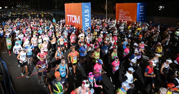 Participants head out from the starting point during the 2026 Two Oceans Marathon in Cape Town, South Africa, on April 11, 2026