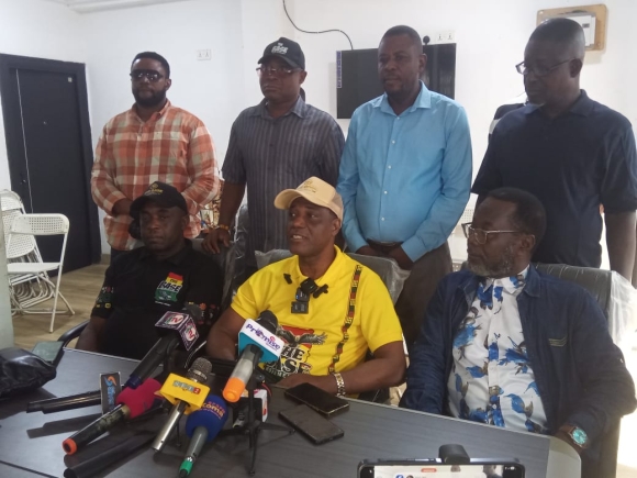 Mr Jacob Osei Yeboah (middle), Chief Operations Coordinator, the Base Ghana Movement, while  addressing the media.