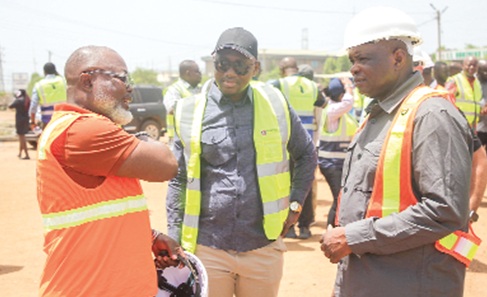 Wisdom Adonu (left), CEO of Mowlem International Limited, briefing Kwame Governs Agbodza and his deputy, Alhassan Suhuyini (middle), on the progress of work at the TT Brothers Junction Wisdom Adonu (left), CEO of Mowlem International Limited, briefing Kwame Governs Agbodza and his deputy, Alhassan Suhuyini (middle), on the progress of work at the TT Brothers Junction