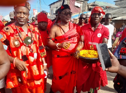 Nii Ahene Nunoo III, Abola Mantse and his kingsmen sprinkling kpokpoi to mark the celebration