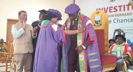 Prof. Goski Alabi (2nd from left), UMaT Council Chair,  robing Prof. Benard Kumi-Boateng as Vice-Chancellor