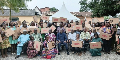 AlexanderAfenyo-Markin (middle seated) with the beneficiary teachers after the presentation