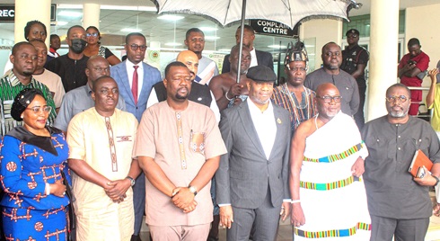 Julius Neequaye Kotey (3rd from left), CEO, DVLA, with Nii Tackie Teiko Tsuru II (3rd from right), Ga Mantse; Nii Ahene Nunoo III (2nd from right), Abola Mantse; members of the King’s entourage and staff of DVLA