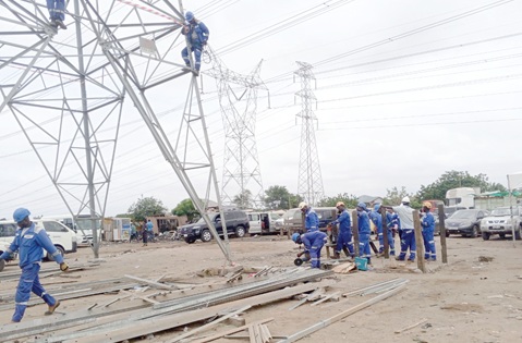 Engineers working to fix the damaged pylon