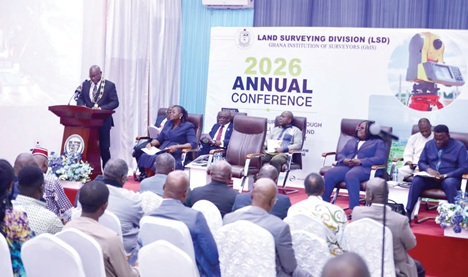 Emmanuel Kofi Cobbold (left), President of the Ghana Institution of Surveyors, addressing the participants