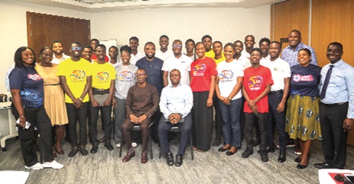 George Arhin (seated left), Country Assurance Leader of PwC, with Abeku Gyan-Quansah (seated right), Tax Partner of PwC, the delegation from Graphic and finalists after the event Picture: CALEB VANDERPUYE