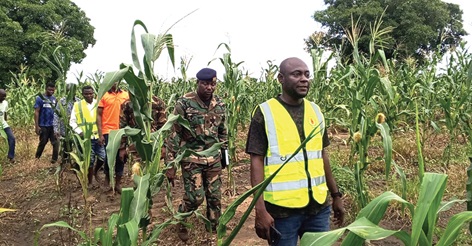 Tahiru Rafiu, North East Regional Director of NADMO, leading some personnel to conduct assessment of flood prone areas