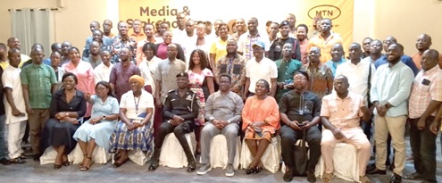 Dignitaries and journalists after the forum