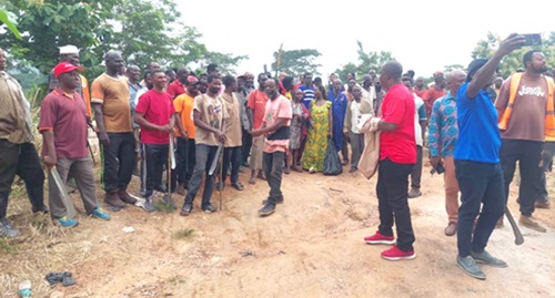 Nicholas Osei-Wusu (2nd from right) addressing the residents during the exercise