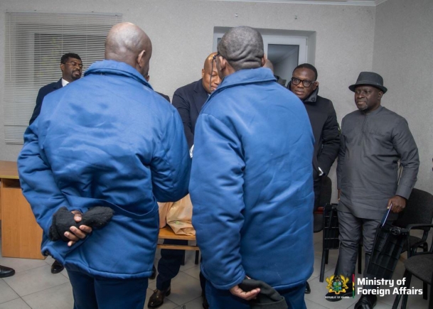 The two Ghanaian prisoners of war shaking hands with Samuel Okudzeto Ablakwa, the Minister of Foreign Affairs.