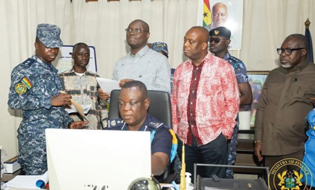Dr Cassiel Ato Forson (2nd from right), Minister of Finance, and Thomas Nyarko Ampem (right), Deputy Minister of Finance, interacting with some Customs officers during the tour