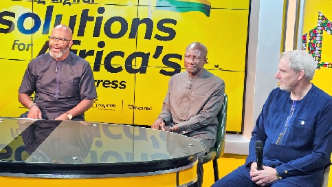 Ralph Mupita (left), MTN Group CEO, answering a question from the media. With him are Ebenezer Asante (middle), Senior Vice-President of MTN Group, and Stephen Blewett, CEO, MTN Ghana