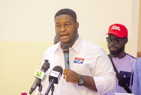 Alfred Ababio Kumi, NPP National Youth Organiser aspirant, addressing the media during the event. Picture: CALEB VANDERPUYE