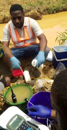 An official of the EPA working on the chemicals for the dechemicalisation of the Birim River An official of the EPA working on the chemicals for the dechemicalisation of the Birim River