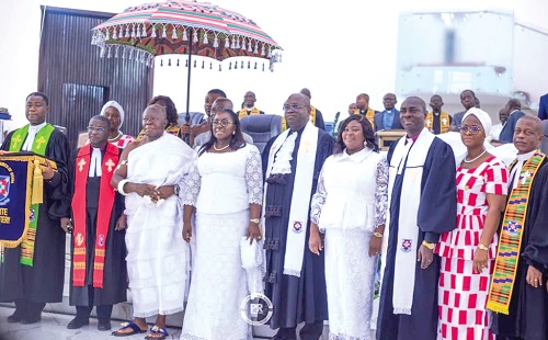 Otumfuo Osei Tutu II (3rd from left), Asantehene, Lady Julia (4th from left), his wife, Rt Rev. Dr Abraham Nana Opare Kwakye (5th from right), Moderator of the PCG, and Rev. David Aboagye-Danquah (3rd from right), Clerk of the General Assembly of the PCG, after the church service