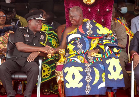 Otumfuo Osei Tutu II (right), Asantehene, in a handshake with Christian Tetteh Yohuno (left), Inspector General of Police,  during the meeting. Picture: CALEB VANDERPUYE