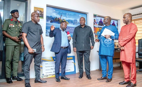 Mark Agodoa (4th from right), Head of GBC’s Digital Platform, briefing President John Dramani Mahama (3rd from right); Felix Kwakye Ofosu (right), Minister of Government Communications; Prof. Amin Alhassan (2nd from right), Director-General of GBC, and other dignitaries on the functions and activities of the Digital Studio Department, highlighting how it manages content creation, digital broadcasting and online engagement during a tour of the Social Media Office Mark Agodoa (4th from right), Head of GBC’s Digital Platform, briefing President John Dramani Mahama (3rd from right); Felix Kwakye Ofosu (right), Minister of Government Communications; Prof. Amin Alhassan (2nd from right), Director-General of GBC, and other dignitaries on the functions and activities of the Digital Studio Department, highlighting how it manages content creation, digital broadcasting and online engagement during a tour of the Social Media Office