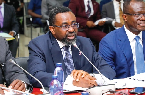 Dr Johnson Asiama (left), Governor, Bank of Ghana, addressing the committee. Picture: ELVIS NII NOI DOWUONA 