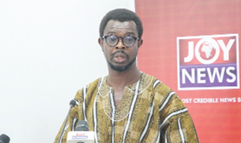Prof. Yegandi Paul Alagidede (inset), Professor of Finance at the University of Ghana, addressing the audience at the event. Picture: CALEB VANDERPUYE
