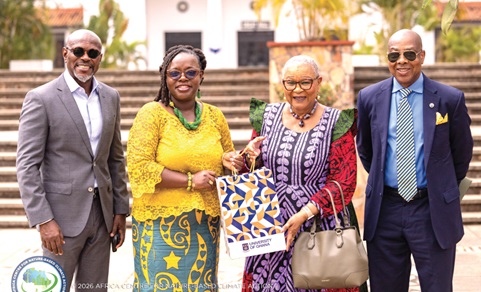 Rev. Dr. Joyce Rosaline Aryee (2nd from right), Board Chairperson, Africa Centre for Nature-Based Climate Action, presenting a gift to Prof. Nana Aba Appiah Amfo, (2nd from left), Vice Chancellor of the University of Ghana, after the meeting. With them are Mr Emmanuel Vincent, Board Member of AC4NCA, and Kwaku Sakyi-Addo (left), a board member of AC4NCA.