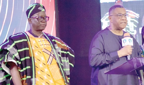 Dr Augustus Goosie Tanoh (right), Presidential Adviser on the 24-Hour Economy and Accelerated Export Development, speaking at the forum.  With him is Donatus Akamugri Atanga, Upper East Regional Minister