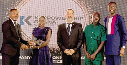 Sandra Amarquaye (2nd from left), Communications Manager of Karpowership Ghana, receiving the award from a representative of Health, Environment, Safety and Security Awards. With them are members of staff of  Karpowership Ghana